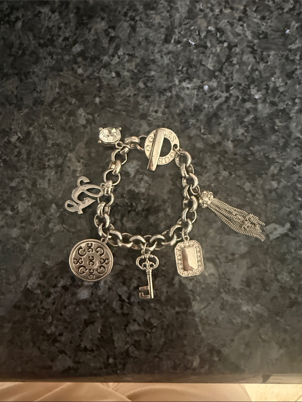Silver Charm Bracelet with Key, Tassel & Crystal Accents